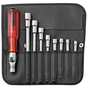 Screwdriver sets with reversible handle and interchangeable blades in roll-up pouch